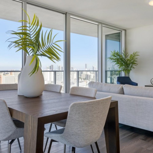 a room with a table and chairs