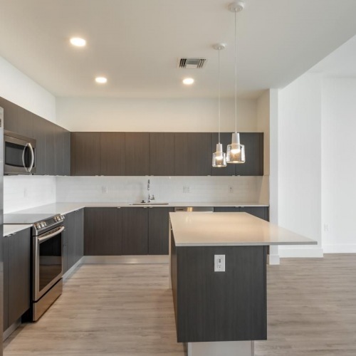 Beautiful kitchens with designer finishes a kitchen with stainless steel appliances